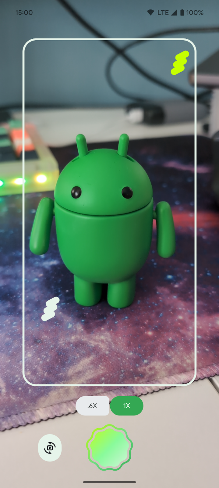 Androidify app UI showing camera button